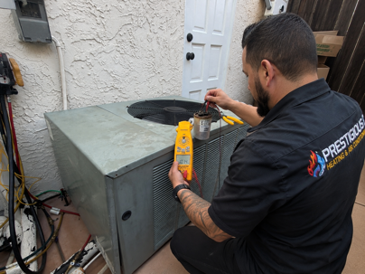 HVAC technician diagnosing AC breaker keeps tripping in Carlsbad CA